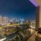 SML Vacation Homes - Sky High Apartments with Burj Khalifa and Dubai Fountain Views at Grande Signature, Downtown Dubai