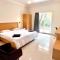 Morjim Sunset Guesthouse- Apartments with Kitchen & AC Rooms