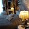 Chambre Bounty, B&B, cuisine privée, lit queen size, terrasse, parking, garage