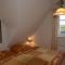 Ferien unterm Reetdach Whg 03