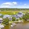Sleeps 24 Waterfront Dock Golf Cart Walk to Beach