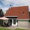Ferienhaus HET GANZELAND by FeWo-PLAN OOST100 direkt am LAUWERSMEER gelegen