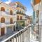 Terrace under Taormina just a few minutes walk to the free beach and downtown!