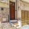 Terrace under Taormina just a few minutes walk to the free beach and downtown!