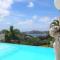 Maison avec vue sur la mer à La Trinité, piscine partagée