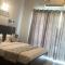Pearl suites at Omex entrenity - Vrindāvan