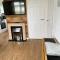 Signature, Scratby - Two bed chalet, sleeps 7, free Wi-Fi, bed linen and towels included, pets welcome and onsite entertainment available