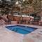 2 BR 3BA Condo - AC, Heated Pool, Walk to Town