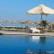 Coral Paradise Beach Front WIFI - 赫尔格达