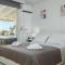 Central penthouse studio with Jacuzzi in Varkiza - Vari