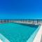 Ocean View Balcony just STEPS to the Beach with Pool, Parking and Wi-Fi! - New Smyrna Beach