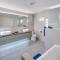 Westshore Beach House by Blue Sky Luxury