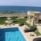 Luxury Beachfront Villa with a Pool