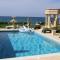 Luxury Beachfront Villa with a Pool