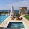 Luxury Beachfront Villa with a Pool