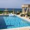 Luxury Beachfront Villa with a Pool