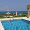 Luxury Beachfront Villa with a Pool