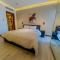 Porto New Cairo - Nyoum compound Modern 2-Bedroom, Prime Location - 开罗