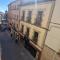 Aloreña con balcones al Real