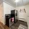 Downtown Red Room at Villages on Aurora - آيرونوود