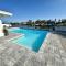 Blue Heron House, Private 4 BR Waterfront w Heated Pool and Fire Pit