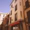 Aloreña con balcones al Real