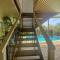Coastal Upper-Level Home with Shared Pool Access - Batehaven