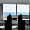 Stunning Top-Floor Beachfront Apartment