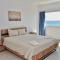 Stunning Top-Floor Beachfront Apartment