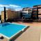Appart avec piscine, entre plage, port et falaises