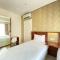 Artistic & Private 2BR Apartment at Parahyangan Residence By Travelio