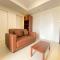 Artistic & Private 2BR Apartment at Parahyangan Residence By Travelio
