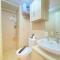 Cozy and Serene 2BR Apartment at Parahyangan Residence By Travelio