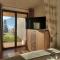 Inspiration - zwei Terrassen mit Seeblick und Garten