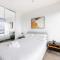City Lights & Cozy Nights 2BR Retreat with a View