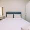 Modern Look and Homey 2BR Transpark Cibubur Apartment near Mall By Travelio