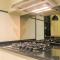 Comfort and Spacious 3BR at Branz BSD City Apartment By Travelio - 当格浪