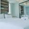 Elegant 1BR at Branz BSD City Apartment By Travelio - 当格浪