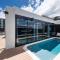 1BR-1BR-1Car-Sleeps 4-Pool-CBD