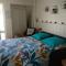 Charmant logement Guidel Plage, vue mer, piscine chauffée, avec une chambre