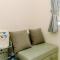 Modern Look 2BR Green Pramuka City Apartment near Mall By Travelio