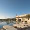 Idunu Villa, with Heated Pool & Serene Seclusion, By ThinkVilla - Roumelí