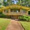 Tranquil Mid-Century Modern Cottage with Forest View