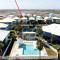 Coastal Escape with Pond Views, Pool Access Grahams Getaway by AvantStay - ميناء أرانساس