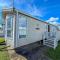 8 Berth Caravan With Decking To Hire At Naze Marine In Essex Ref 17045Nm