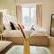 ZenStay - Cozy Studio with City Views