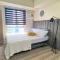 Comfy Stay at Avida Riala IT Park Fast WiFi by Snug Retreat - Cebu City