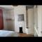 Large room with single bed, work desk and double wardrobe - Feltham