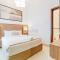 Top-notch 4BR Villa with Sea, Mountain, and Community Views, Assistant Room, and Heated Pool, Al Dana Island, Fujairah by Deluxe Holiday Homes