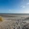 De Strandloper Vakantiehuisje aan het strand - Ferienwohnung am Meer